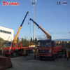 Telescopic-Boom Vehicle-Mounted Cranes with Adjustable Reach Capability