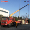Telescopic-Boom Vehicle-Mounted Cranes with Adjustable Reach Capability